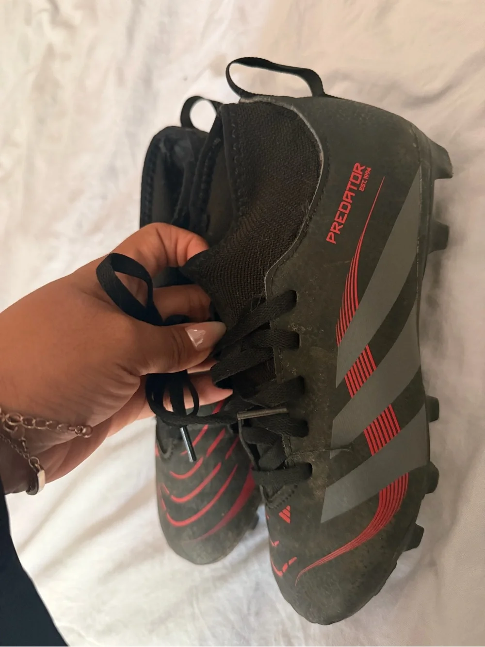 Adidas Predators Black soccer Cleats with Red Accents